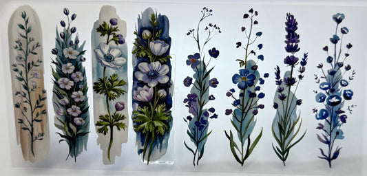 Set of painted pebbles with floral designs 