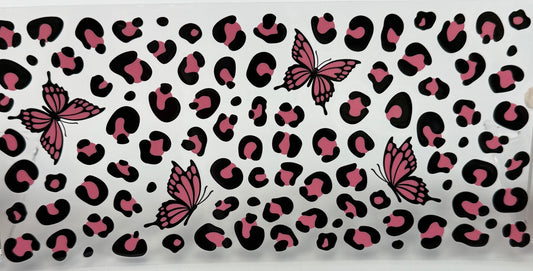 Patterned fabric with pink and black butterfly design 