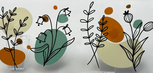 Decorative glass panels with abstract plant designs 