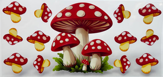 Red and white polka dot mushrooms with green grass 