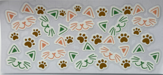 Set of animal-themed stickers with paw prints, triangles, and cat faces 