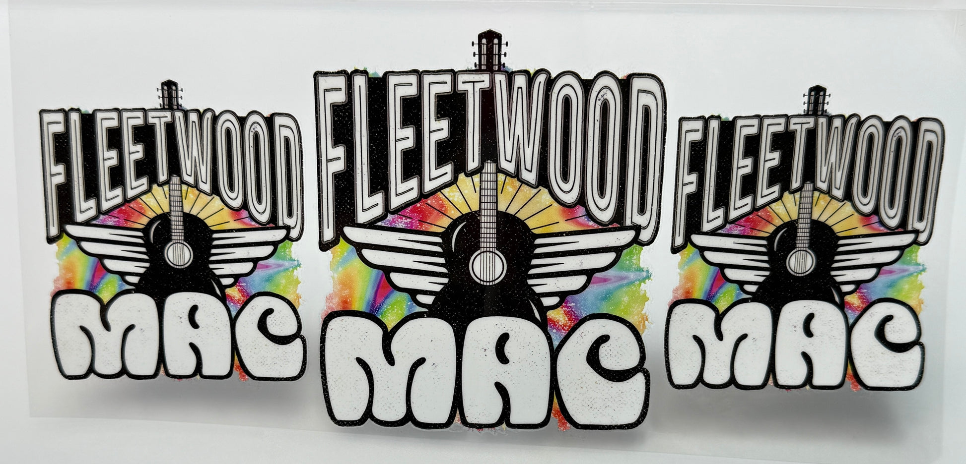 Fleetwood Mac logo with guitars and wings 