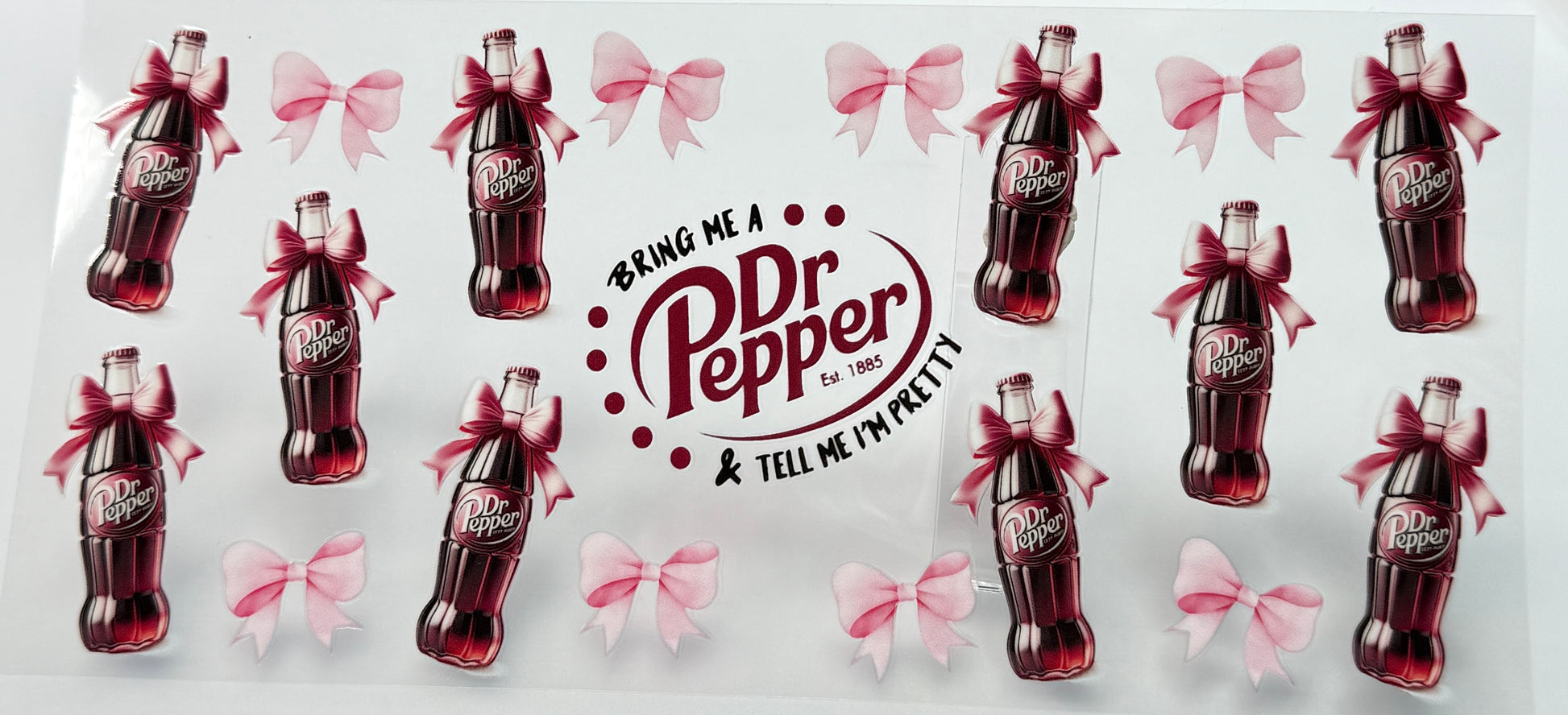 Dr Pepper bottles with pink bows and 'Bring Me a  Pepper & Tell Me a Pretty Story' text 