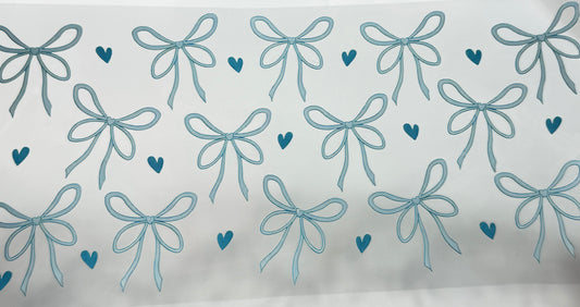 Pattern of blue bows and hearts 