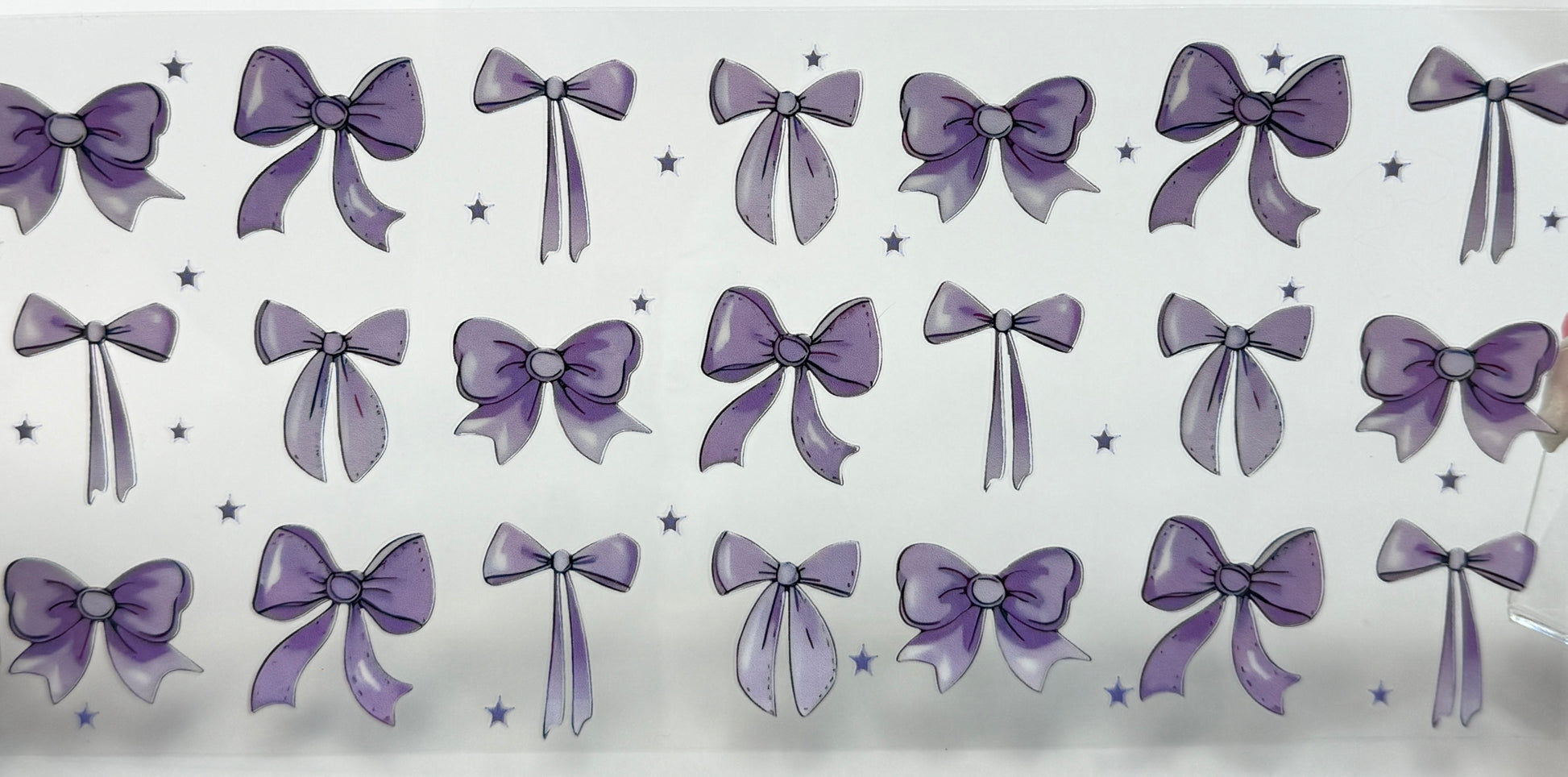 Pattern of purple bows 