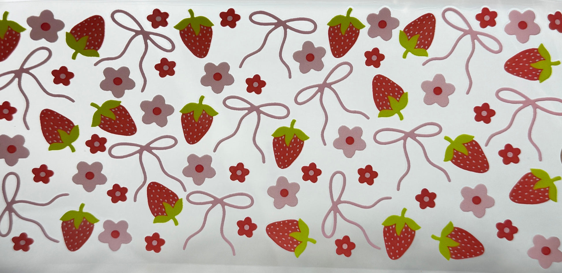 Pattern of strawberries, flowers, and ribbons 