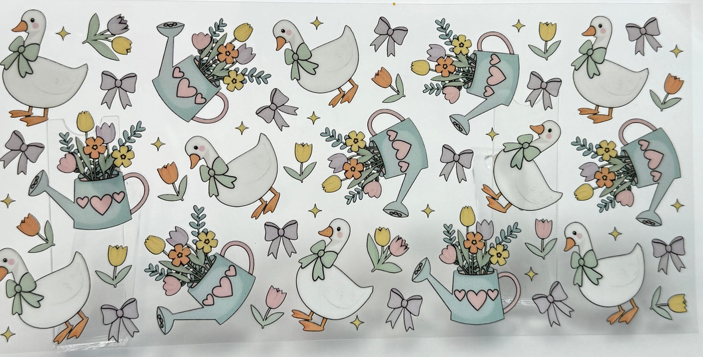 Pattern of ducks, watering cans, and flowers 