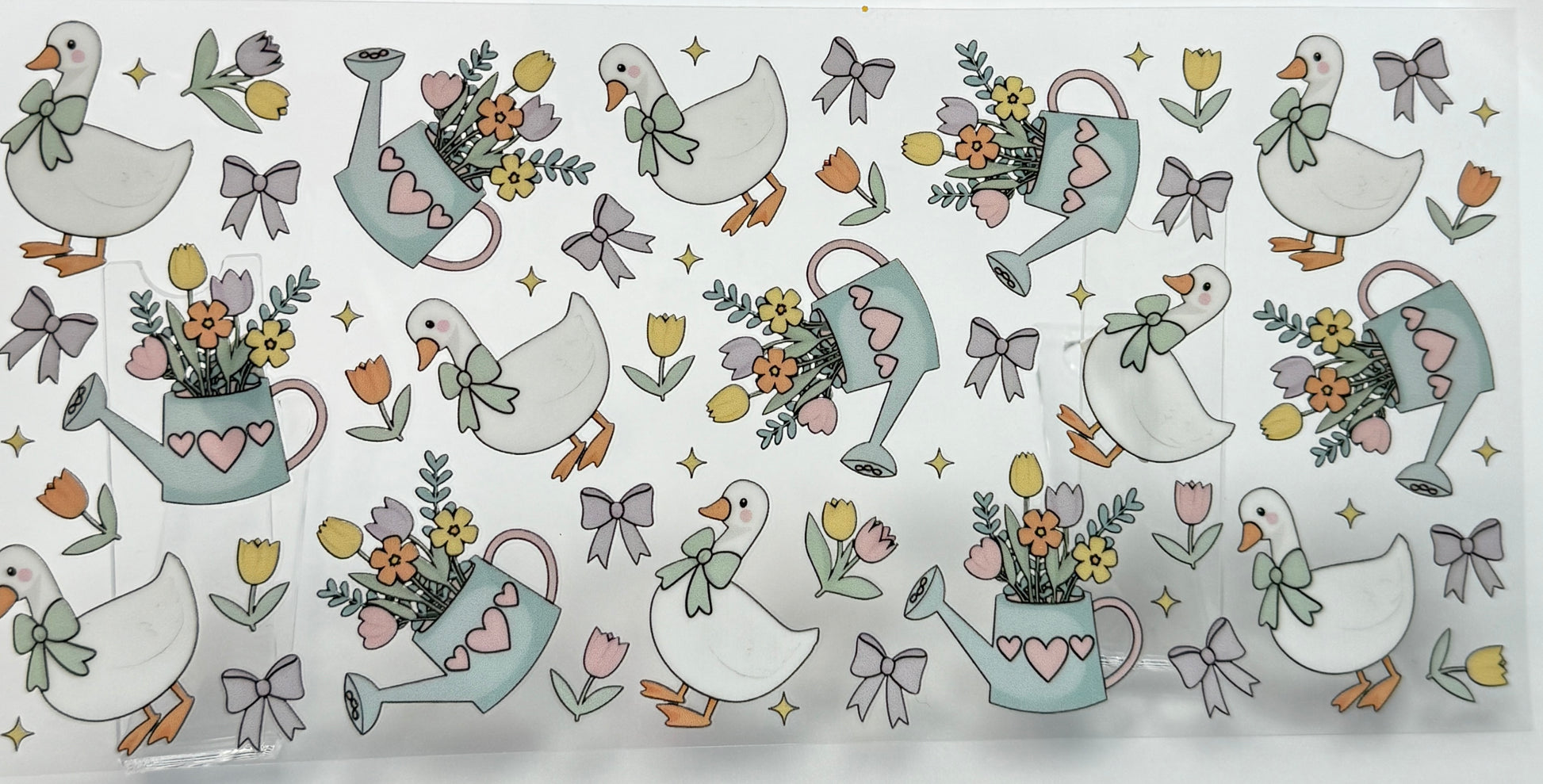 Pattern of ducks, watering cans, and flowers 