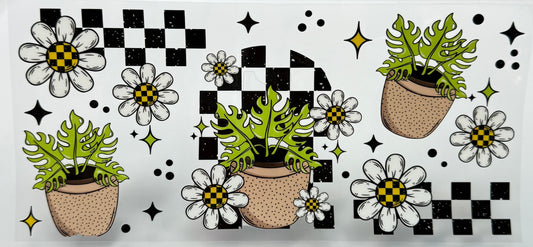 Decorative design with plants, flowers, and checkered pattern 