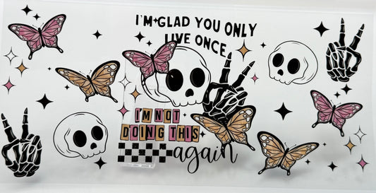 Decorative design with skulls, butterflies, and text 