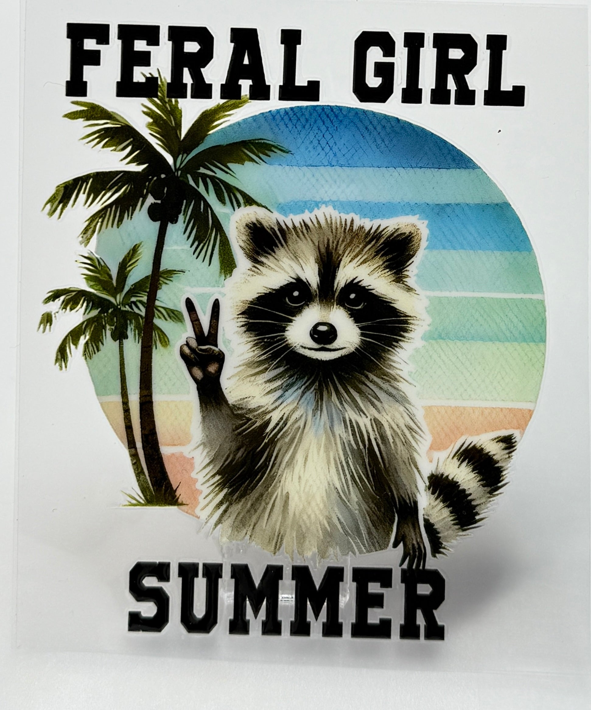 Raccoon with palm trees and 'Feral Girl Summer' text 