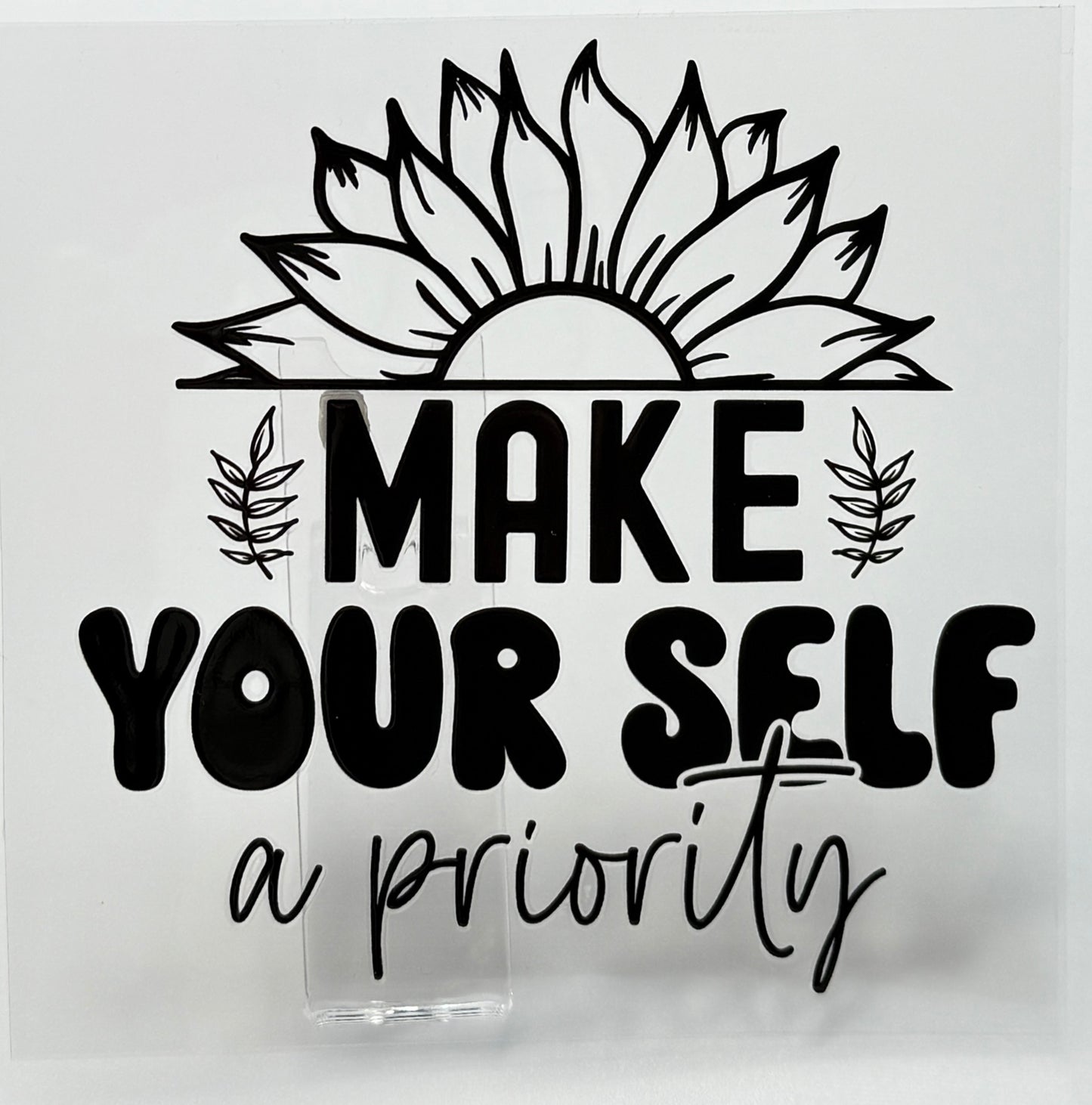 Decorative sign with sunflower design and motivational quote 