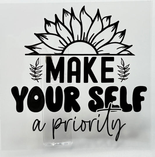 Decorative sign with sunflower design and motivational quote 