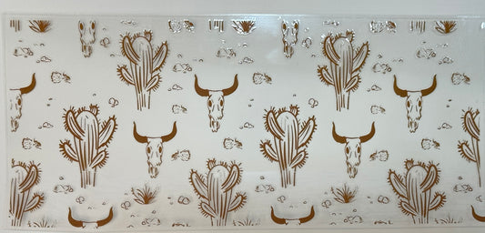 Decorative glass panel with brown cactus and bull skull designs 