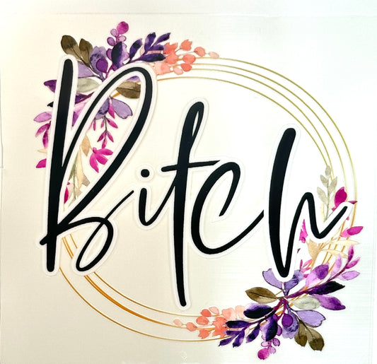 The word 'B!tch' surrounded by floral decorations 