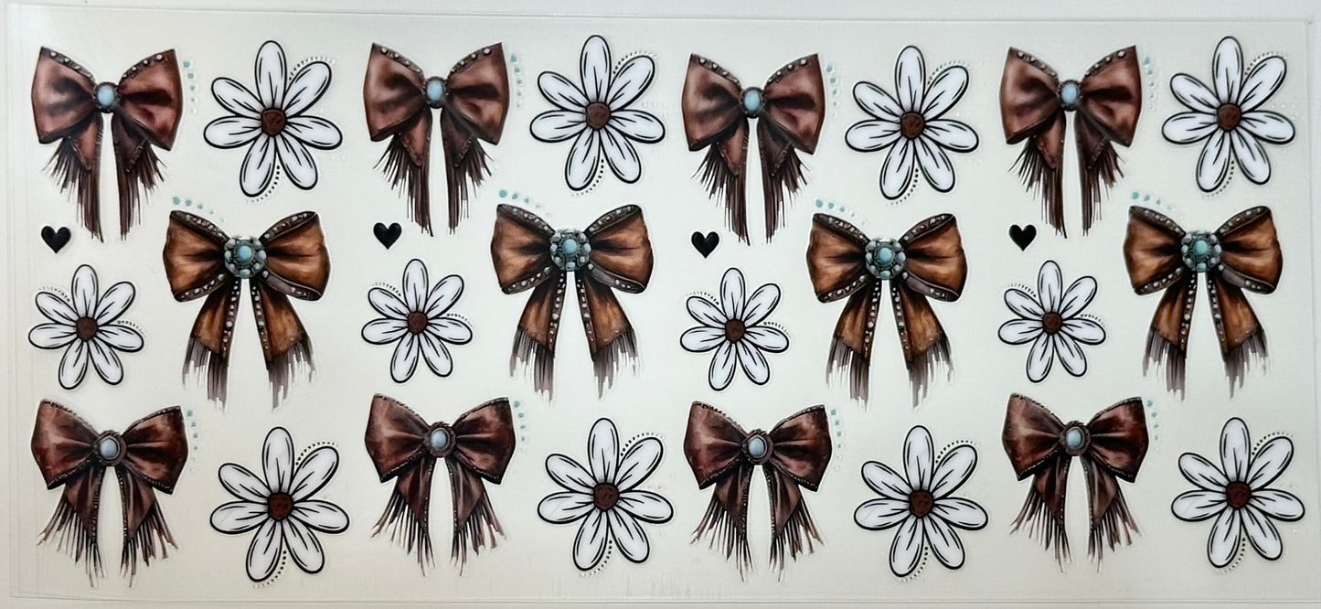 Pattern of brown bows and white flowers 