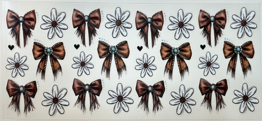 Pattern of brown bows and white flowers 