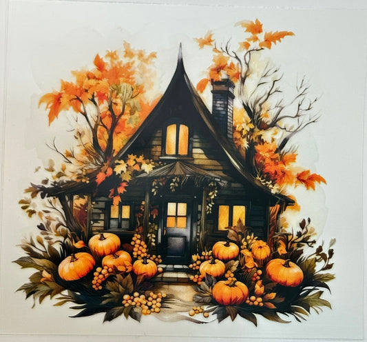 Illustration of a haunted house with pumpkins and autumn leaves 