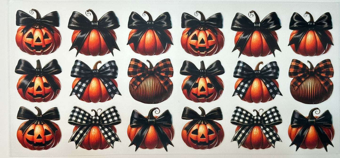 Pattern of pumpkins with black bows 