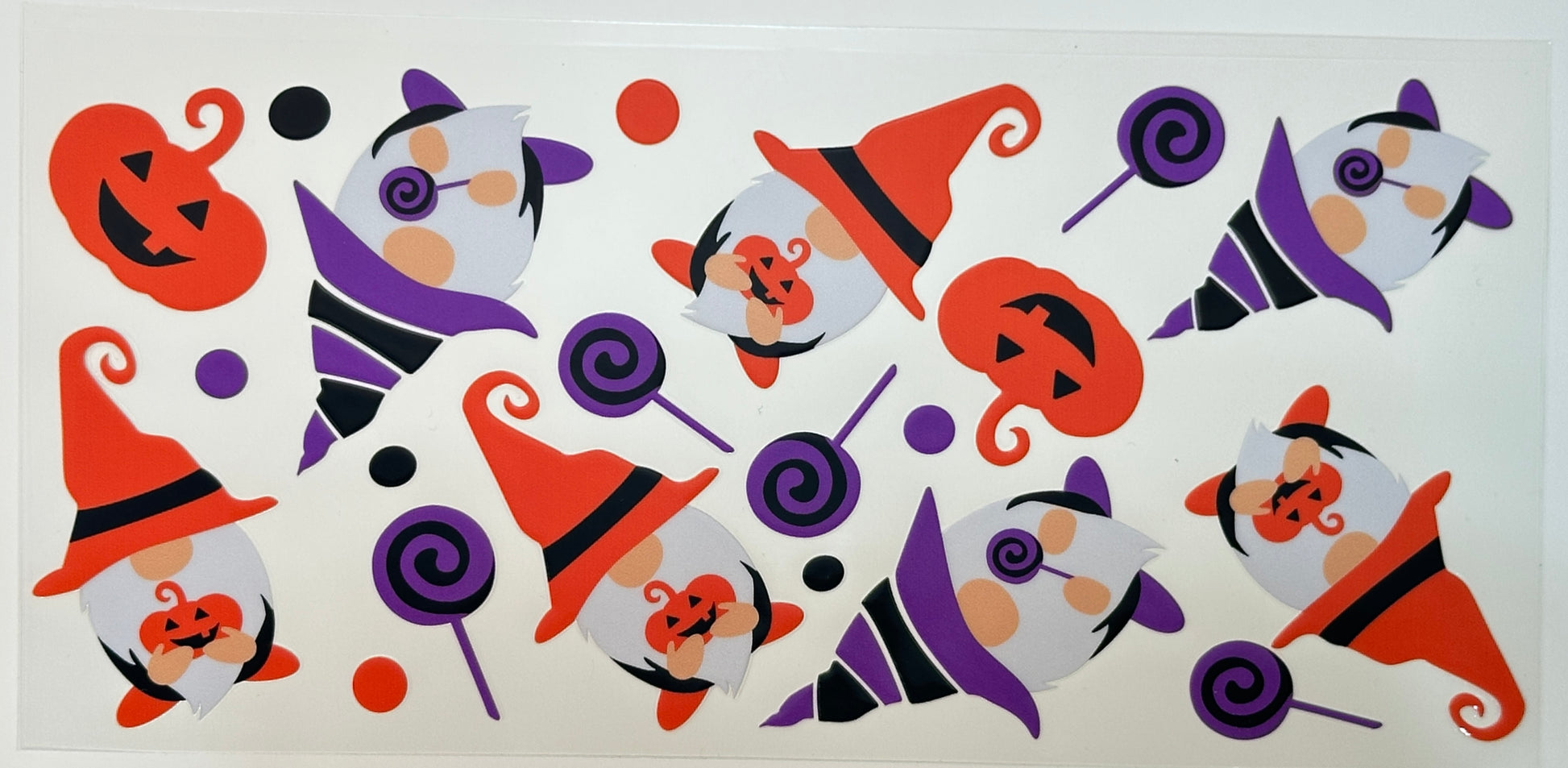 Halloween-themed decorative stickers with pumpkins, witches, and candies 