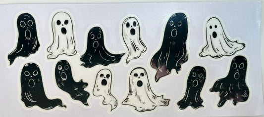 Set of ghost-shaped stickers in various designs 