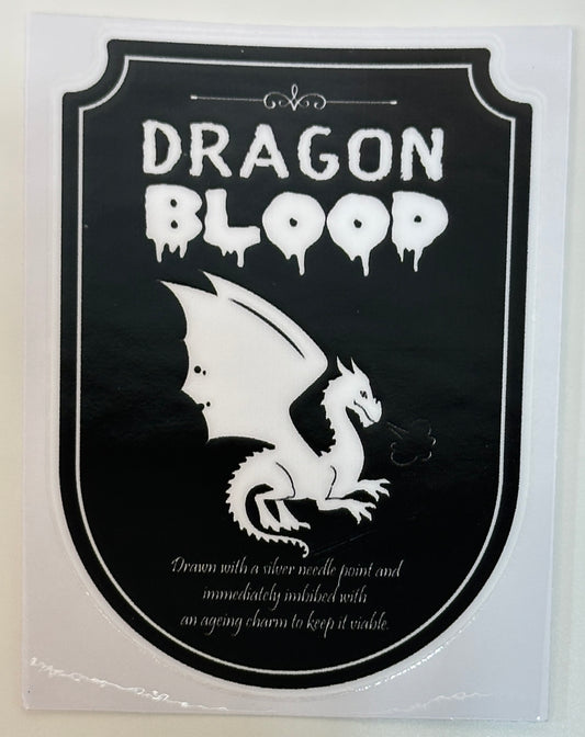 Sticker with dragon design and 'Dragon Blood' text on a black background
