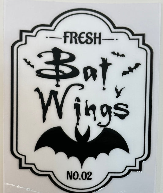 Sticker with 'Fresh Bat Wings' text and bat illustrations 
