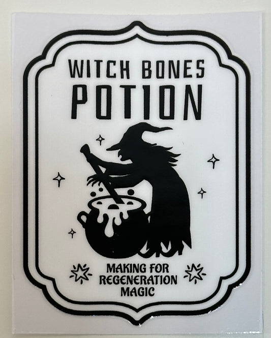 Sticker with 'Witch Bones Potion' design featuring a witch and cauldron 