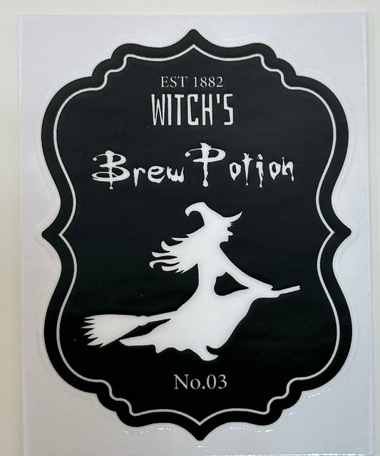 Decorative sign with witch's silhouette and 'Witch's Brew Potion' text 