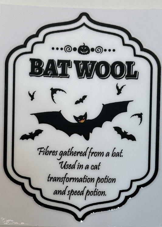 Decorative sign with text and bats 