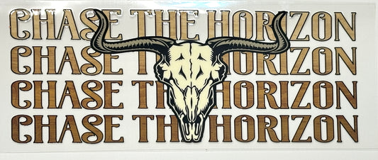 Decorative sign with bull skull and 'Chase the Horizon' text.