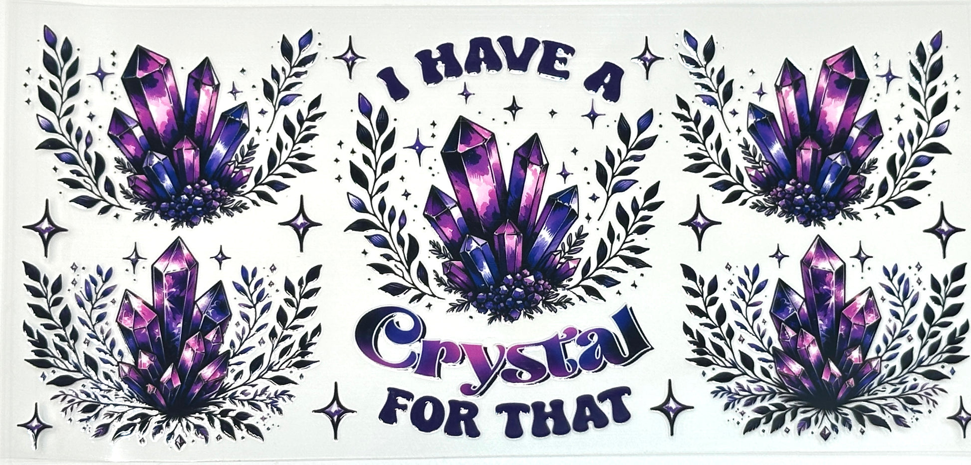 Decorative design with purple crystal graphics and text 'I Have a Crystal for That' 