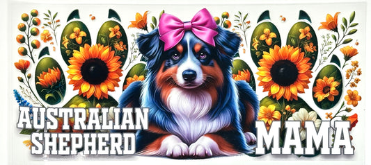 Australian Shepherd with a pink bow surrounded by sunflowers and paw prints with 'AUSTRALIAN SHEPHERD MAMA' text.