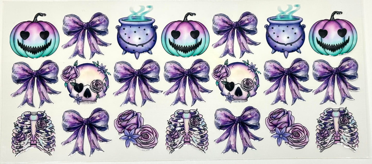 Set of Halloween-themed decorative elements including pumpkins, rib cages, and bows with purple accents 