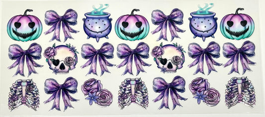 Set of Halloween-themed decorative elements including pumpkins, rib cages, and bows with purple accents 
