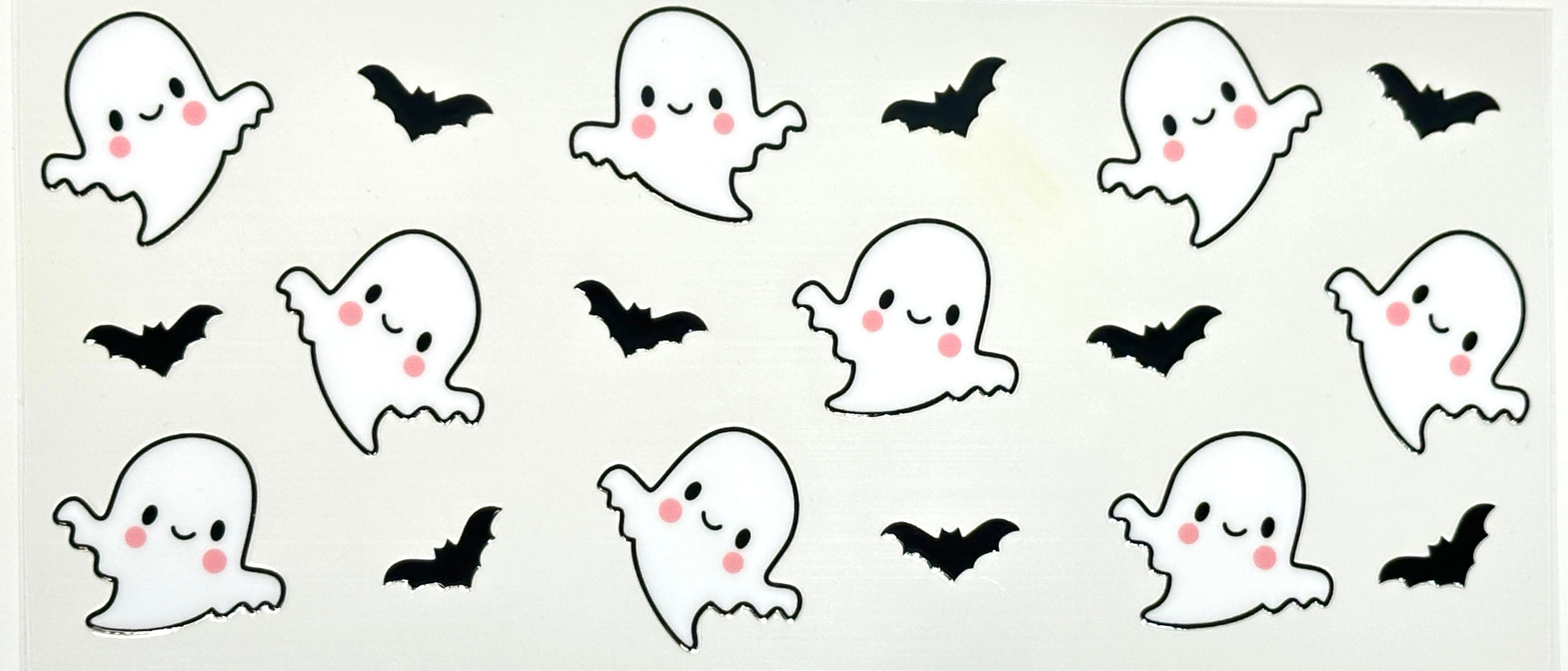 Pattern of cartoon ghosts and bats 