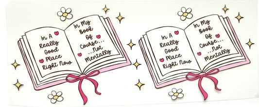 Two open books with text and ribbons on a white background