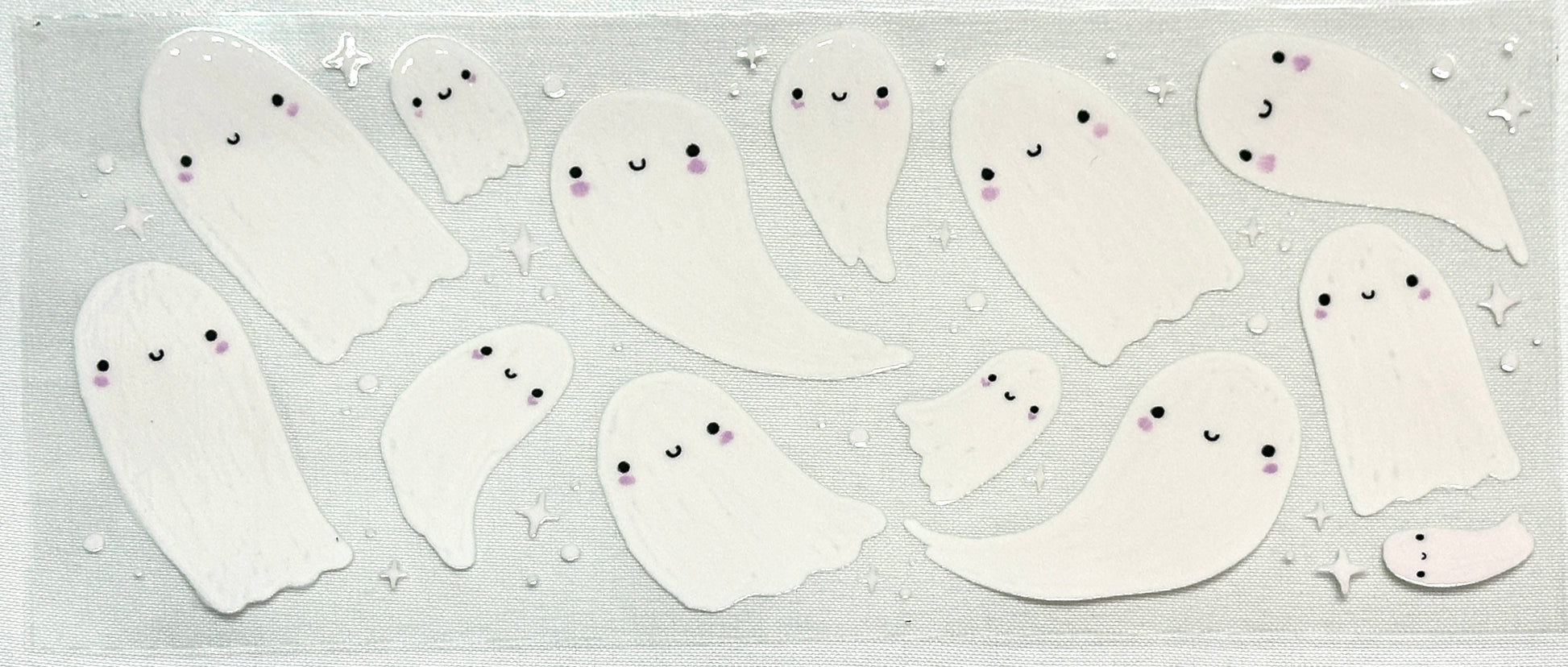 Sheet of ghost stickers with cute faces 