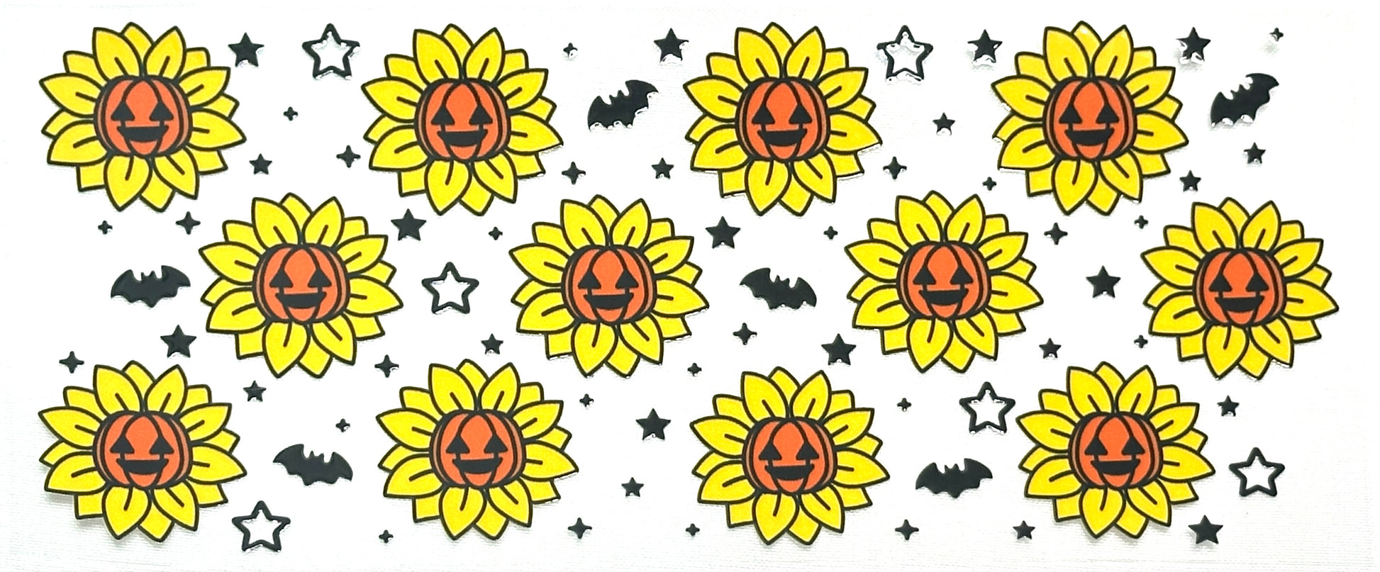 Pattern of sunflowers with pumpkin faces and small bats and stars 