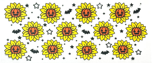 Pattern of sunflowers with pumpkin faces and small bats and stars 