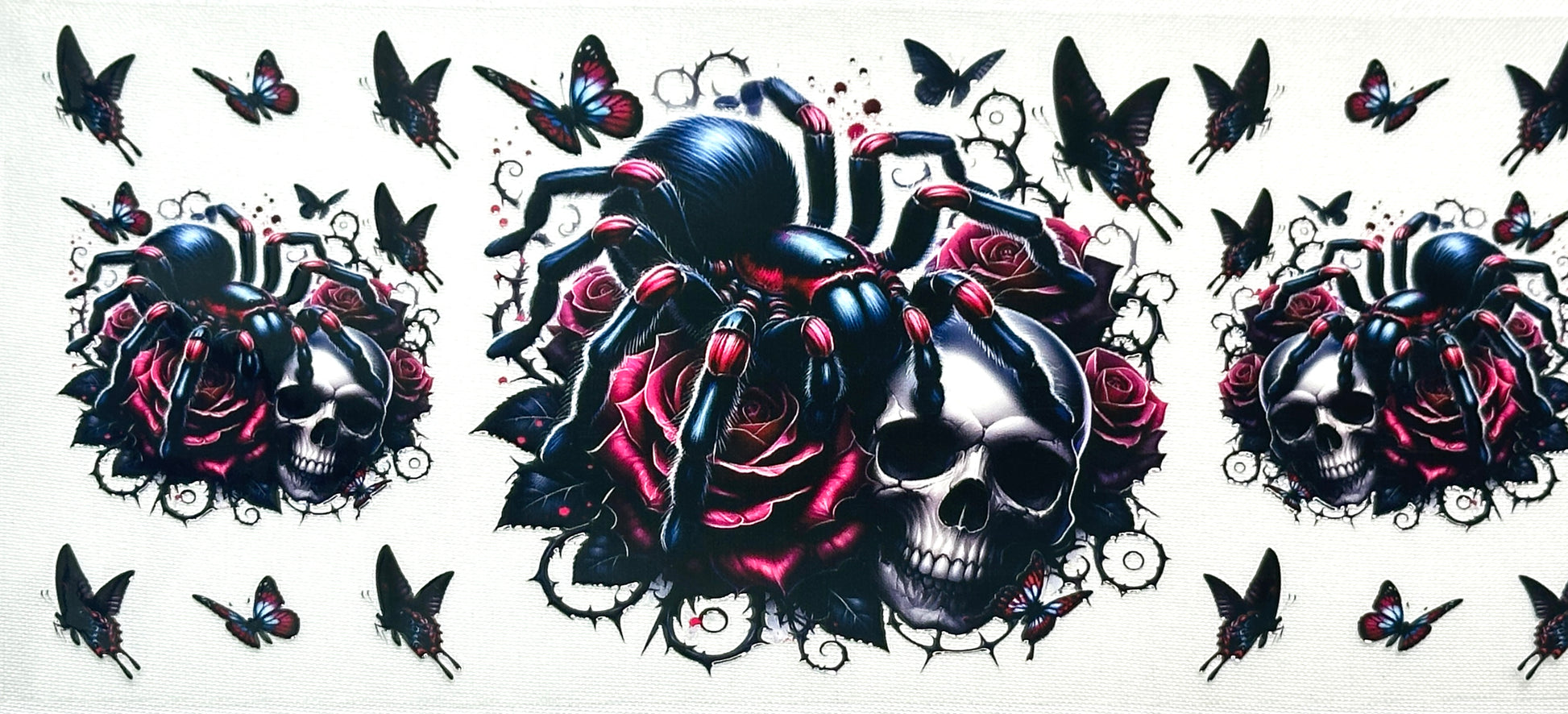 Decorative design with black spider, skulls, roses, and butterflies 