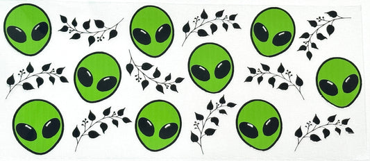 Set of green alien face decals with black branches
