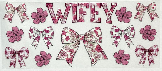 Decorative design with floral bows and the word 'WIFEY' 