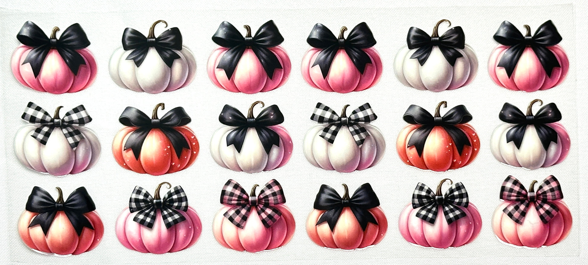 Set of decorative pumpkins with bows in various colors 