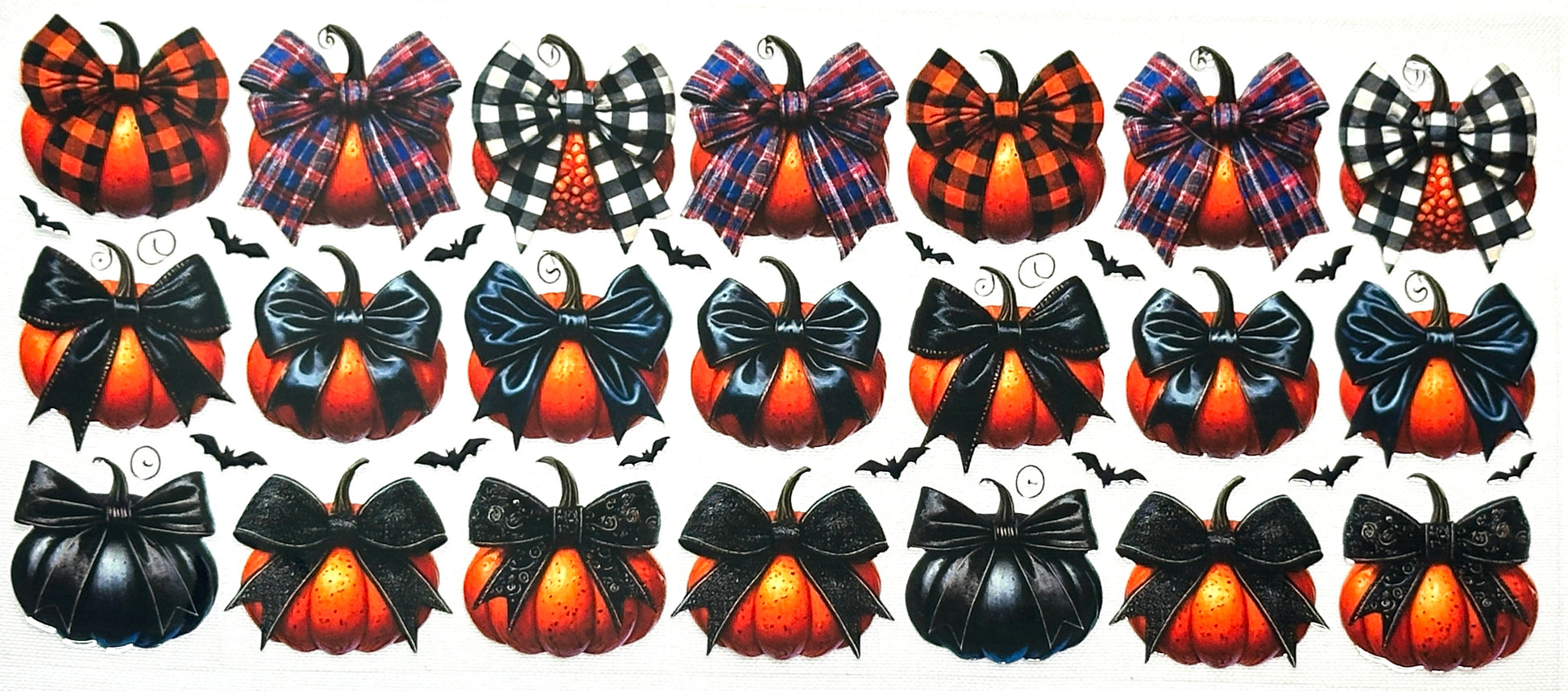 Collection of Halloween-themed decorative items including pumpkins and bows.