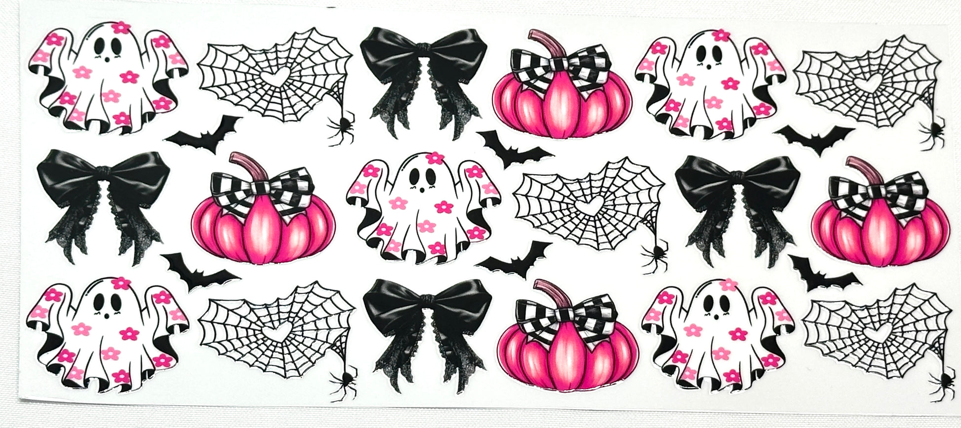 Halloween-themed stickers with ghosts, pumpkins, and bows background