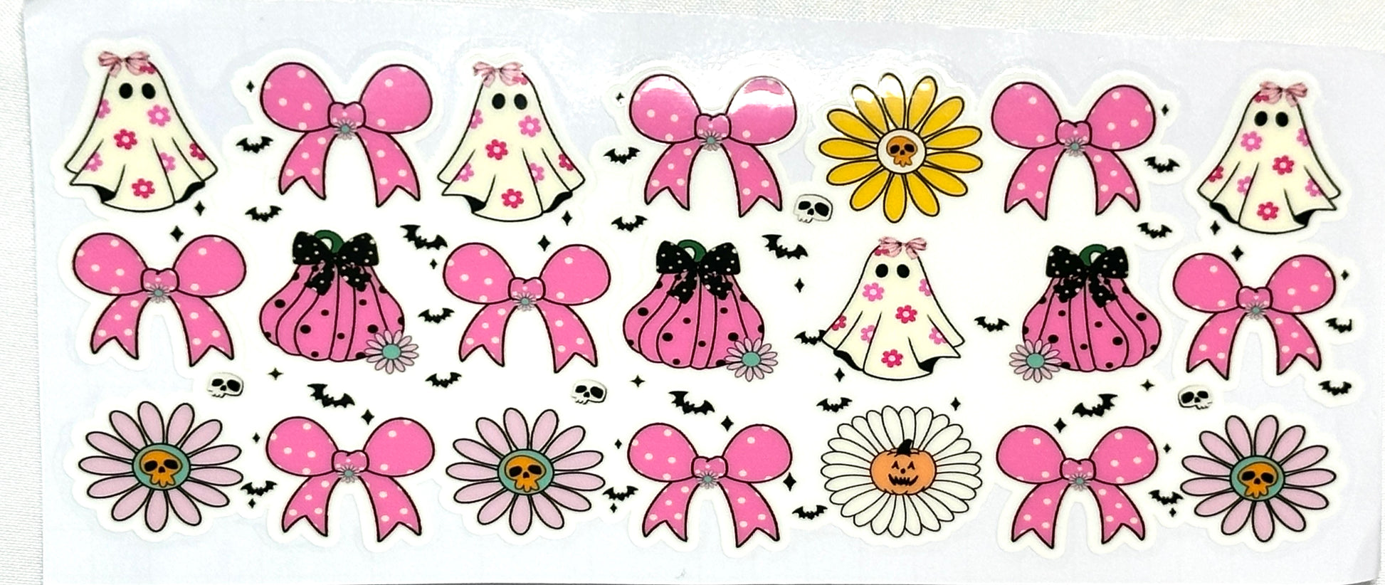 Sticker sheet with pink bows, dresses, and flowers