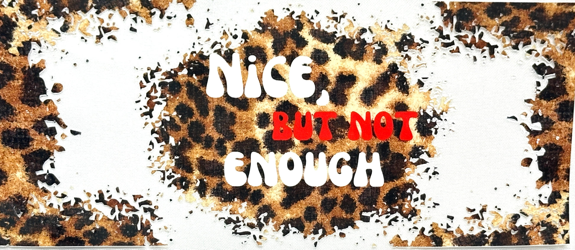 Leopard print background with 'Nice But Not Enough' text
