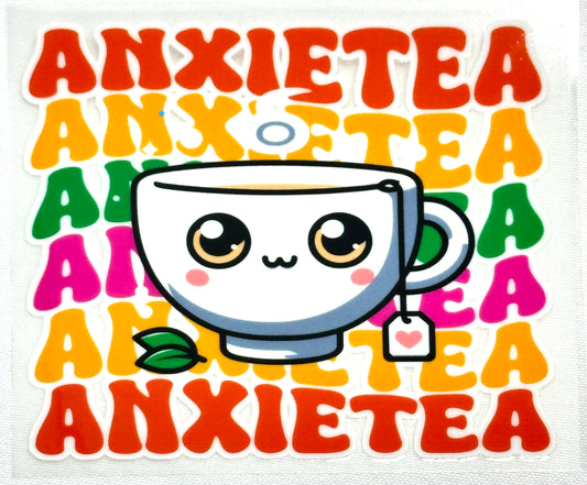 Cartoon tea cup with a teabag and colorful 'Anxietea' text on a white background