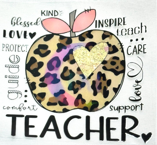 Leopard print apple with a heart and text around it on a white background